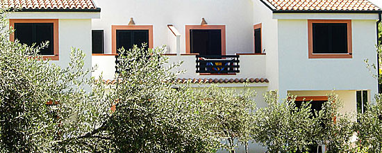 Ferienhaus mit Nutzung des Pool der Anlage